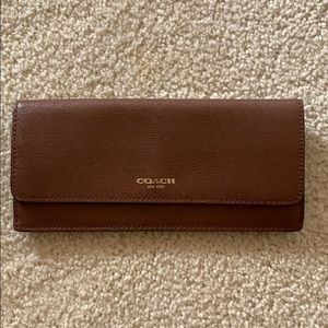 Coach crossgrain leather saddle skinny wallet